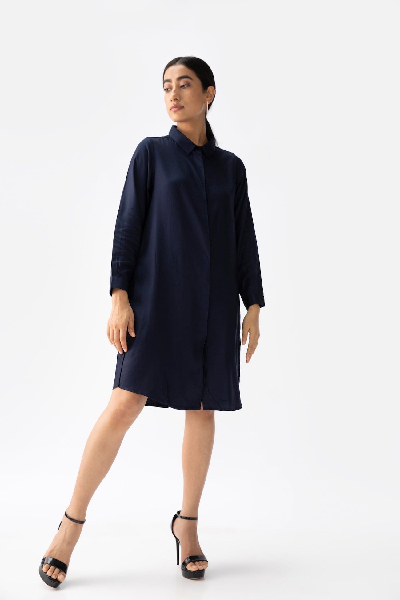 Saltpetre's womens wear - navy blue knee-length long shirt with front buttons, full sleeves and collared neck. Made out of 100% organic cotton.
