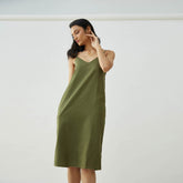 Saltpetre womens wear, indo-western slip dress in olive green for semi formal, casual, occassional wear.
Comfortably elegant dress in indigo blue colour with delicate straps, back slit and side pockets.
