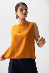 Saltpetre womens wear, indo-western shell top for semi formal, casual, occassional wear. Comfortably elegant woth delivate feminine straps in mustard yelow colour.