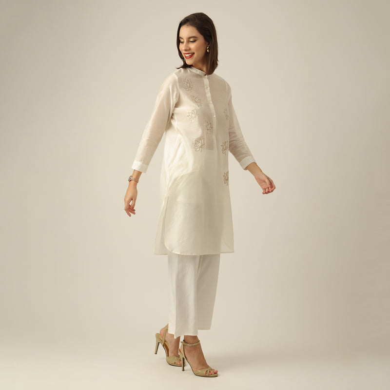 Women Pearl White Chanderi Silk Pleated Tunic  | Hand-Embroidered Lotus Motif