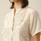 Women Pearl White Chanderi Silk Wrap Collar Shirt with Hand-Embroidered Lotus Motif