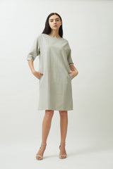 Saltpetre womens wear, indo-western knee length dress for semi formal, casual, occassional wear. Comfortably elegant dress in Cloud grey colour with three quarter sleeves, side slits and side pockets.