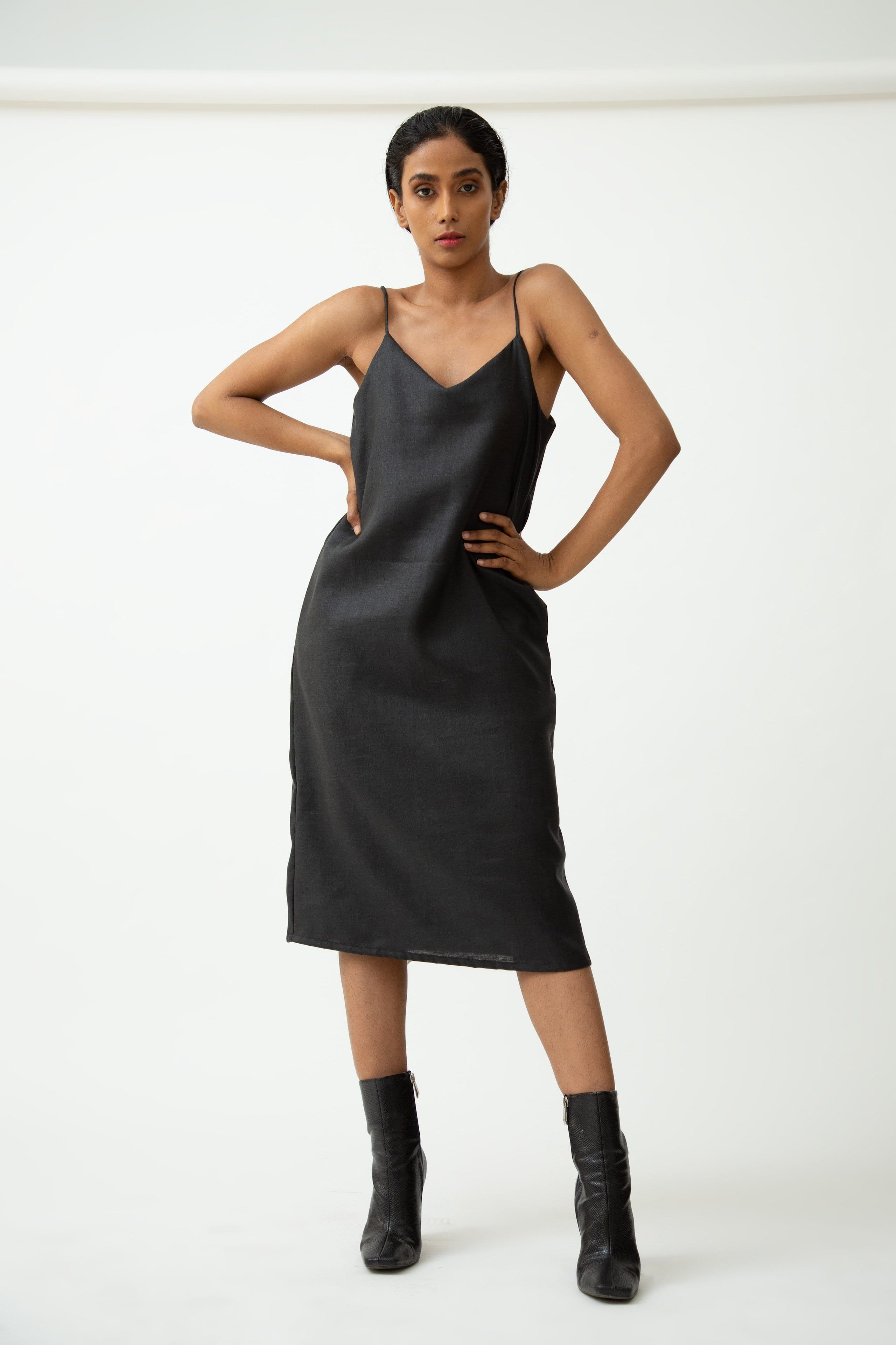 Saltpetre womens wear, indo-western slip dress in charcoal black for semi formal, casual, occassional wear.
Comfortably elegant dress in indigo blue colour with delicate straps, back slit and side pockets.