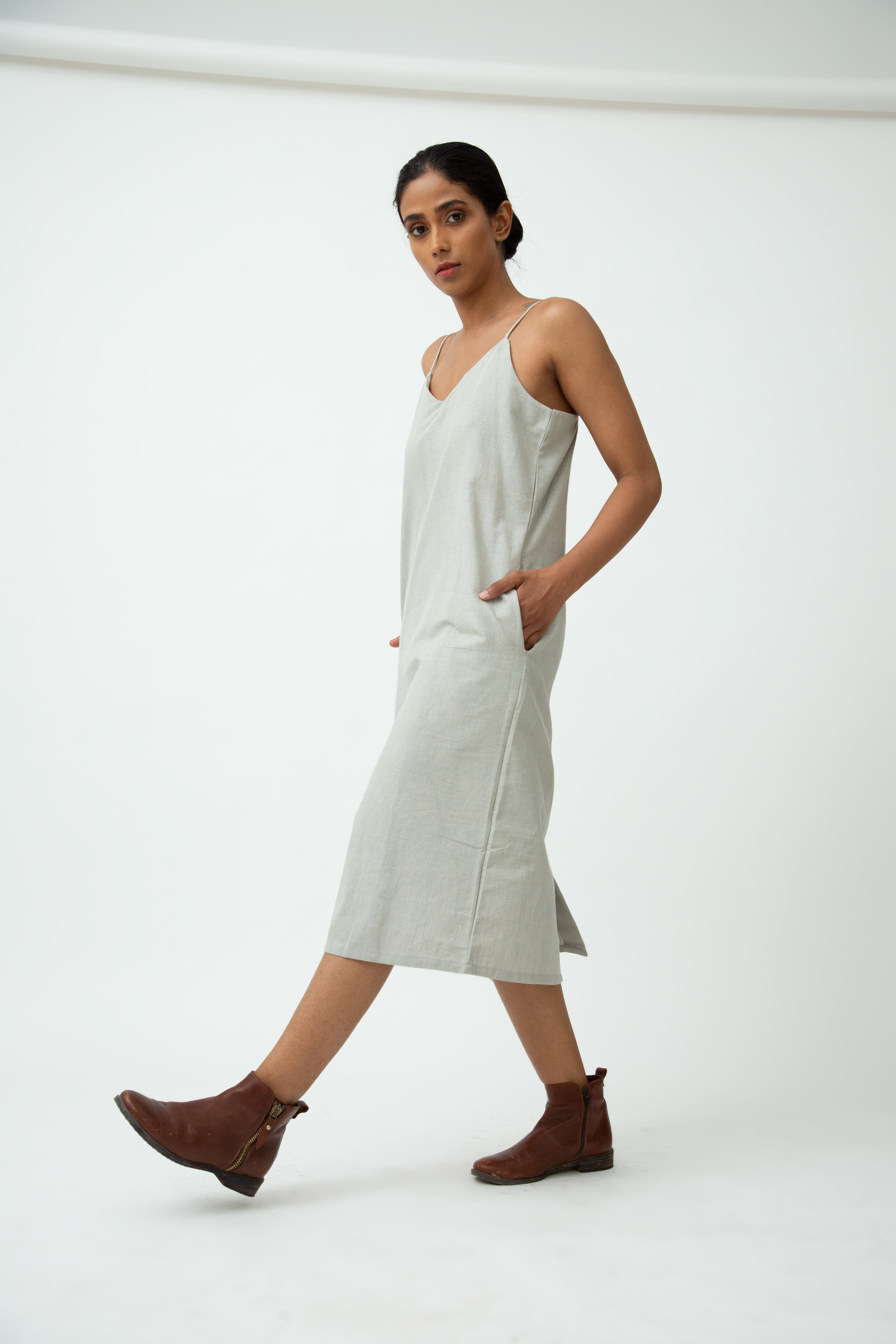 Saltpetre womens wear, indo-western slip dress in cloud grey for semi formal, casual, occassional wear.
 Comfortably elegant dress in indigo blue colour with delicate straps, back slit and side pockets.