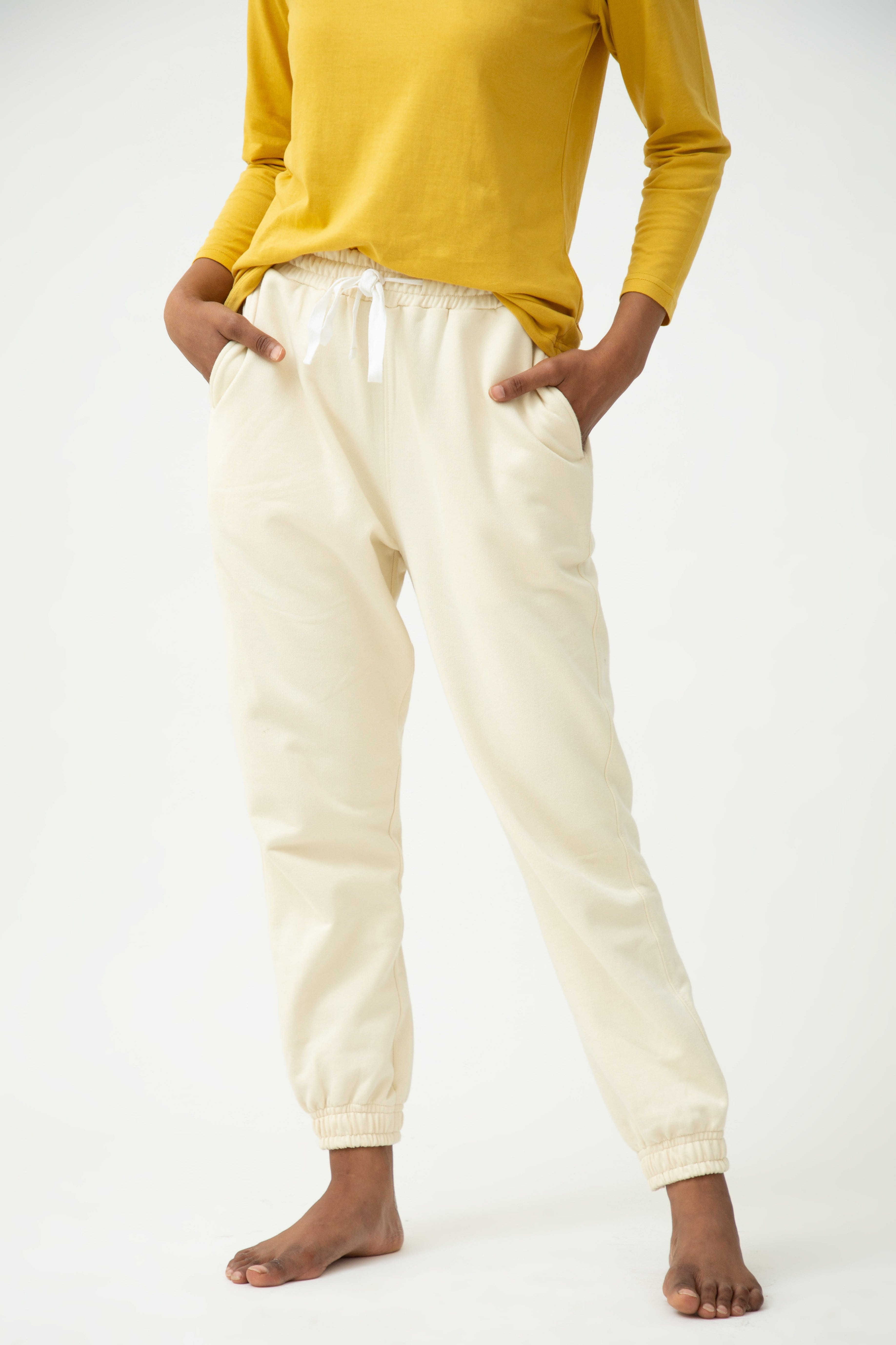 Saltpetre womens wear, lounge wear for casual wear.
 Comfortable joggers with elasticated ankle and side pockets in off white colour. Made from 100% organic cotton.