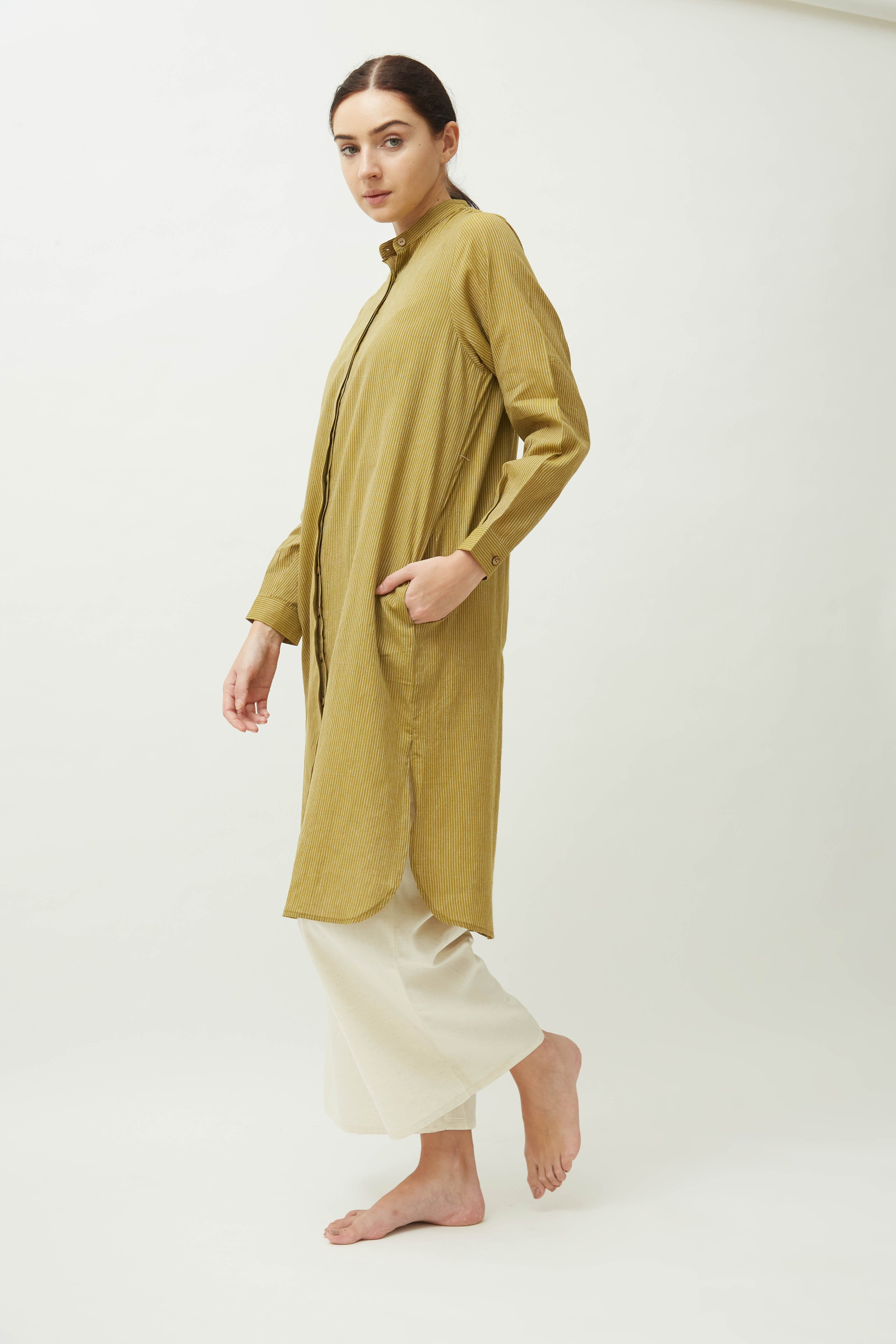 Saltpetre women's long shirt - olive green. With mandarin collared neck, deep side pockets and full sleeves. Made of 100% organic cotton