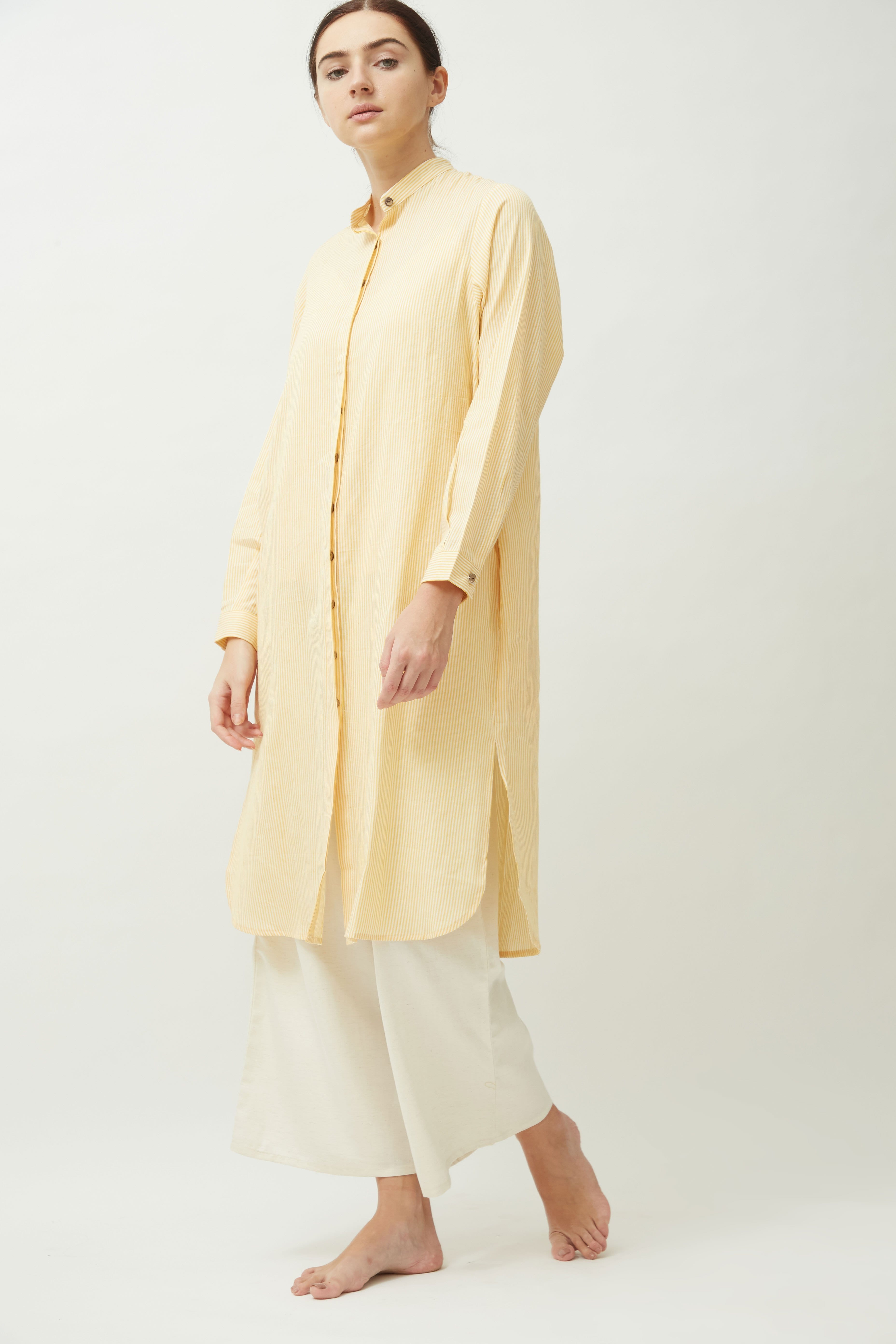 Saltpetre women's long shirt - summer pale yellow. With mandarin collared neck, deep side pockets and full sleeves. Made of 100% organic cotton