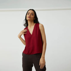 Saltpetre womens wear, indo-western shell top with v-shaped neck in maroon red for semi formal, casual, occassional wear. Comfortably elegant woth delivate feminine straps.