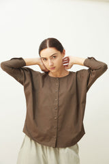 Saltpetre women's semi formal and casual wear in pale blue with high rounded neck and kimono full sleeves. Made from 100% organic cotton and available in all sizes.