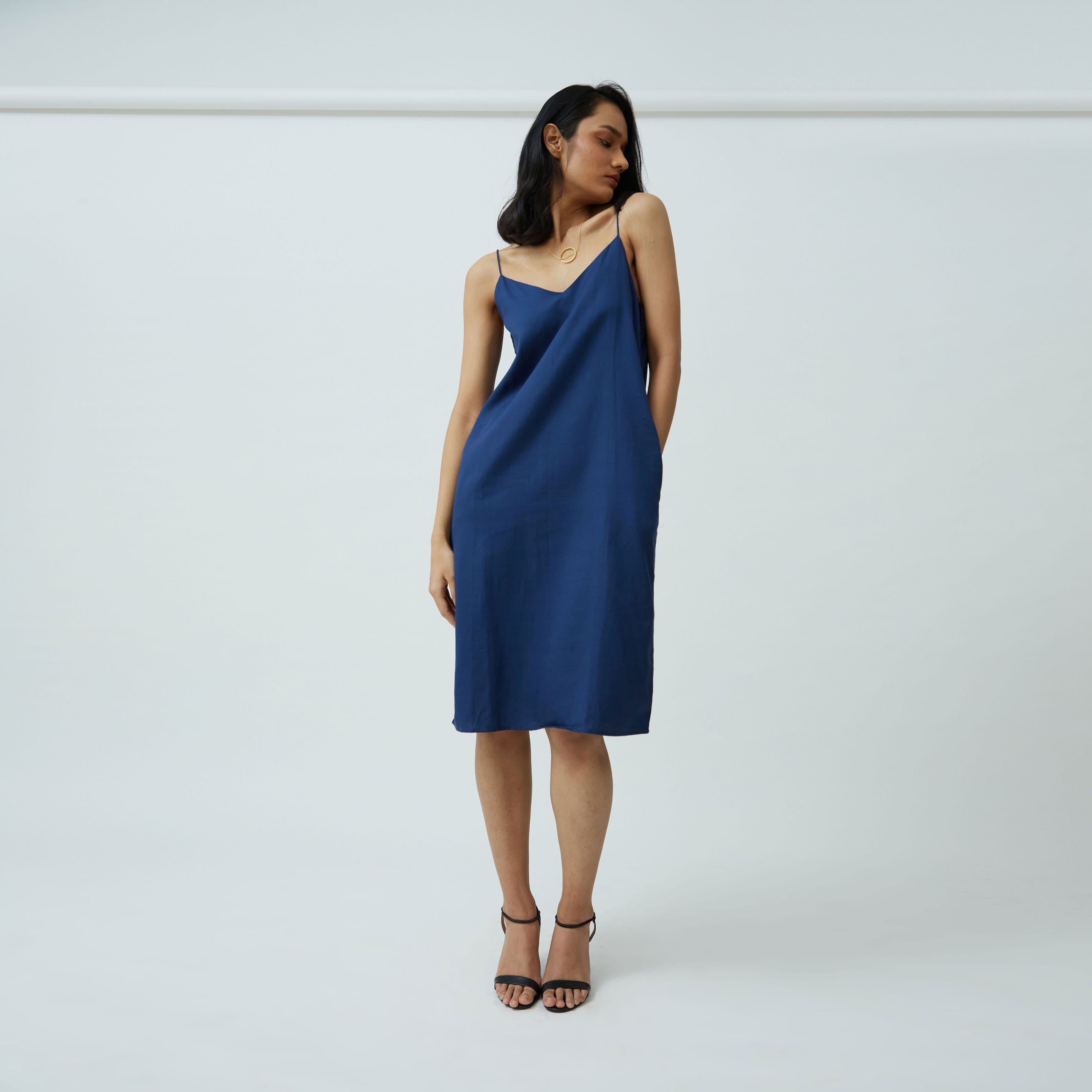 Saltpetre womens wear, indo-western slip dress in Indigo blue for semi formal, casual, occassional wear.
 Comfortably elegant dress in indigo blue colour with delicate straps, back slit and side pockets.