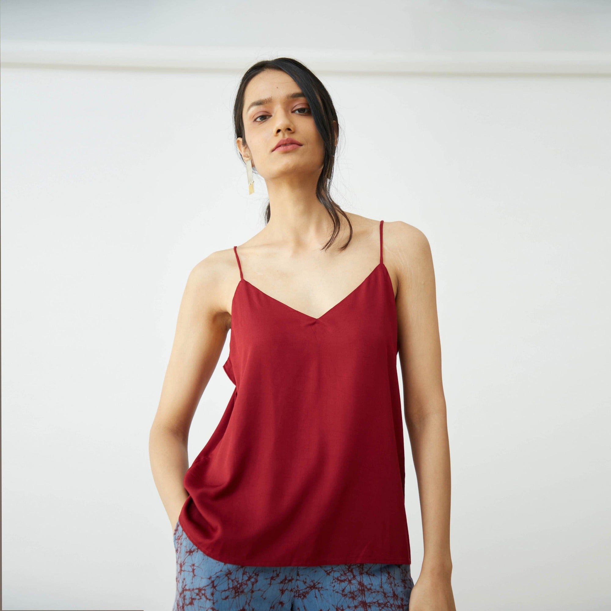 Saltpetre womens wear, indo-western slip top for semi formal, casual, occassional wear.
 Comfortably elegant woth delivate feminine straps in maroon red colour.