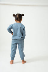 Saltpetre organic, unisex kids wear for boys and girls. Set of blue sweatshirt and joggers 