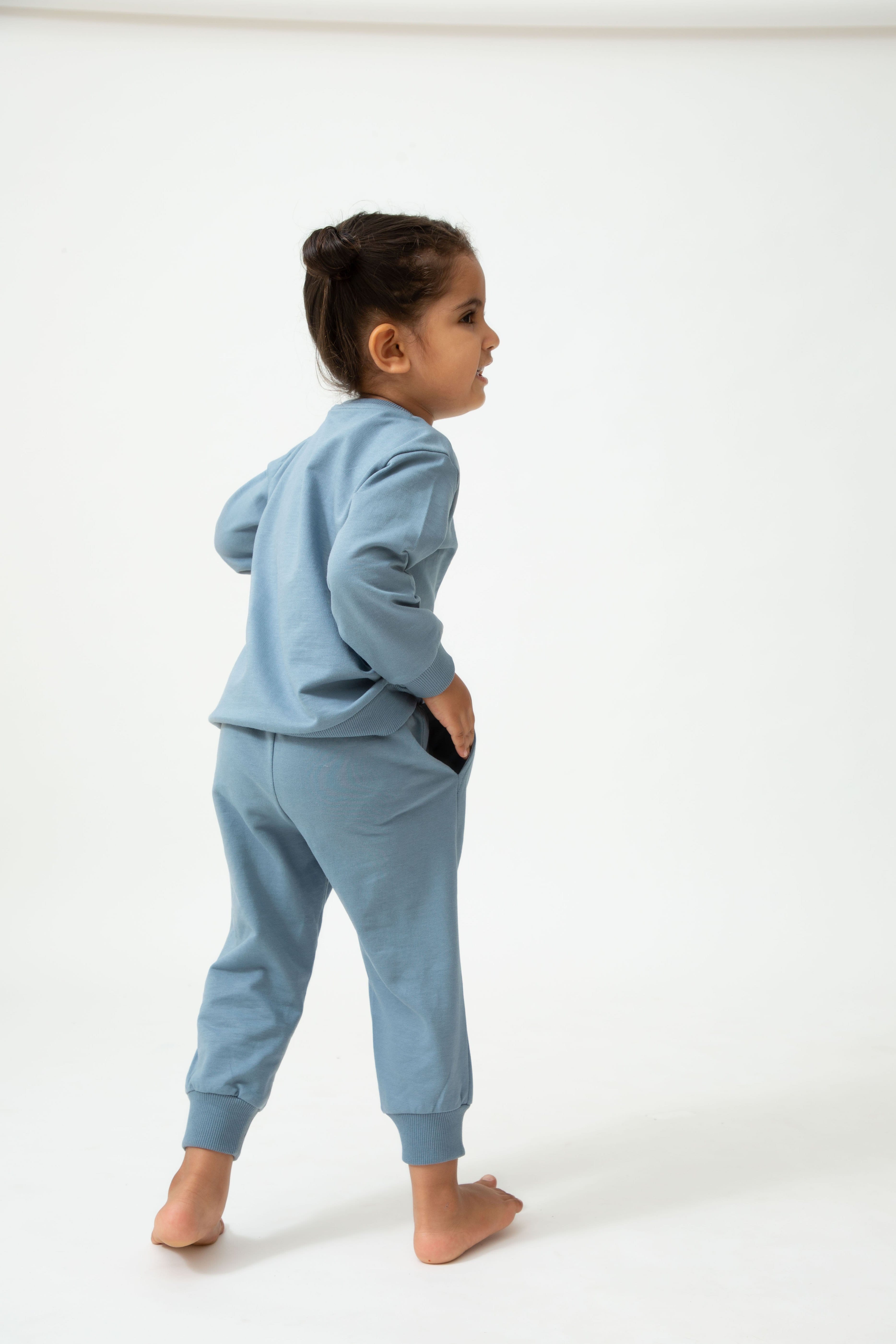 Saltpetre organic, unisex kids wear for boys and girls. Set of blue sweatshirt and joggers 