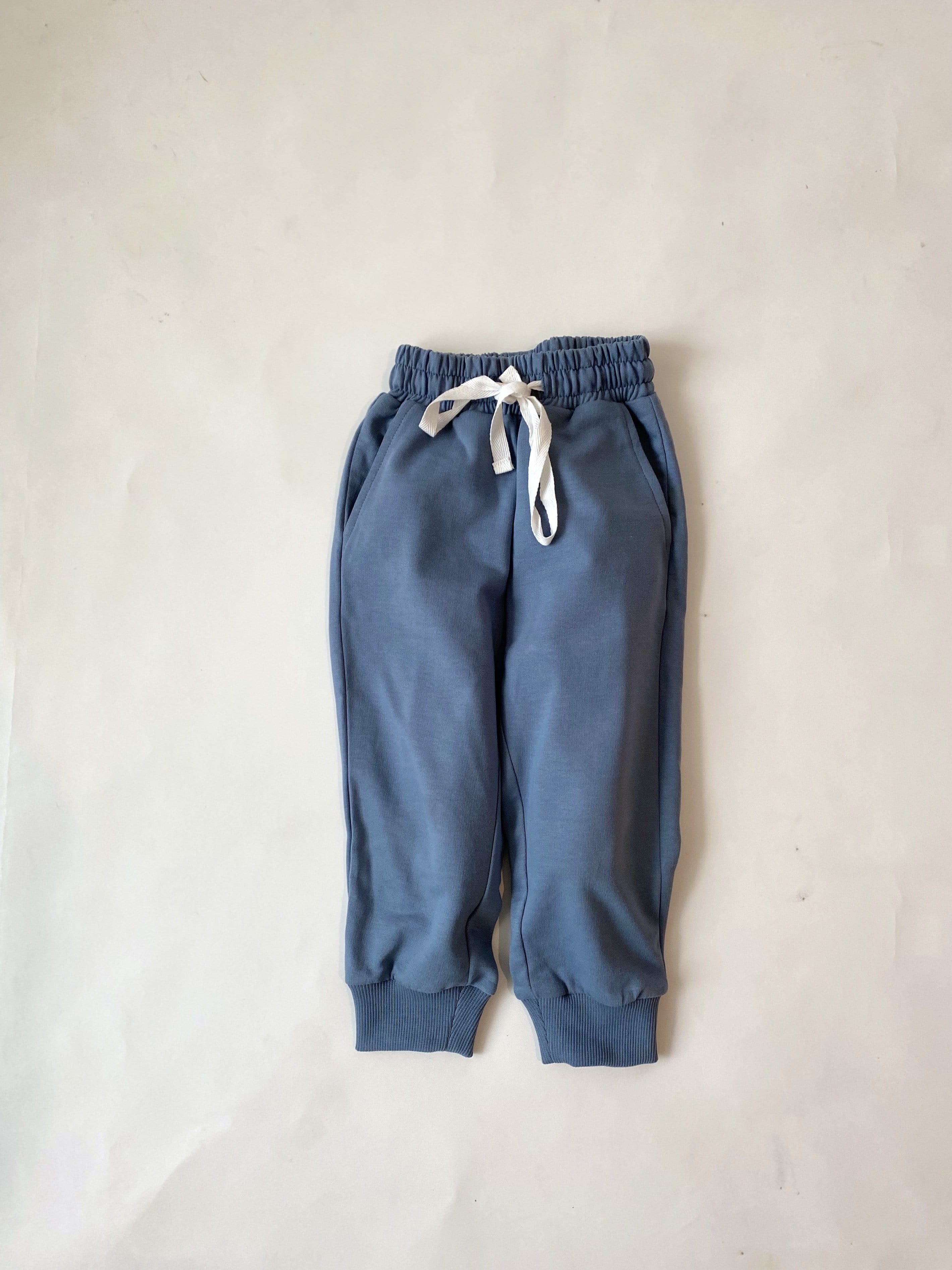 Saltpetre organic, unisex kids wear for boys and girls. Set of blue sweatshirt and joggers 