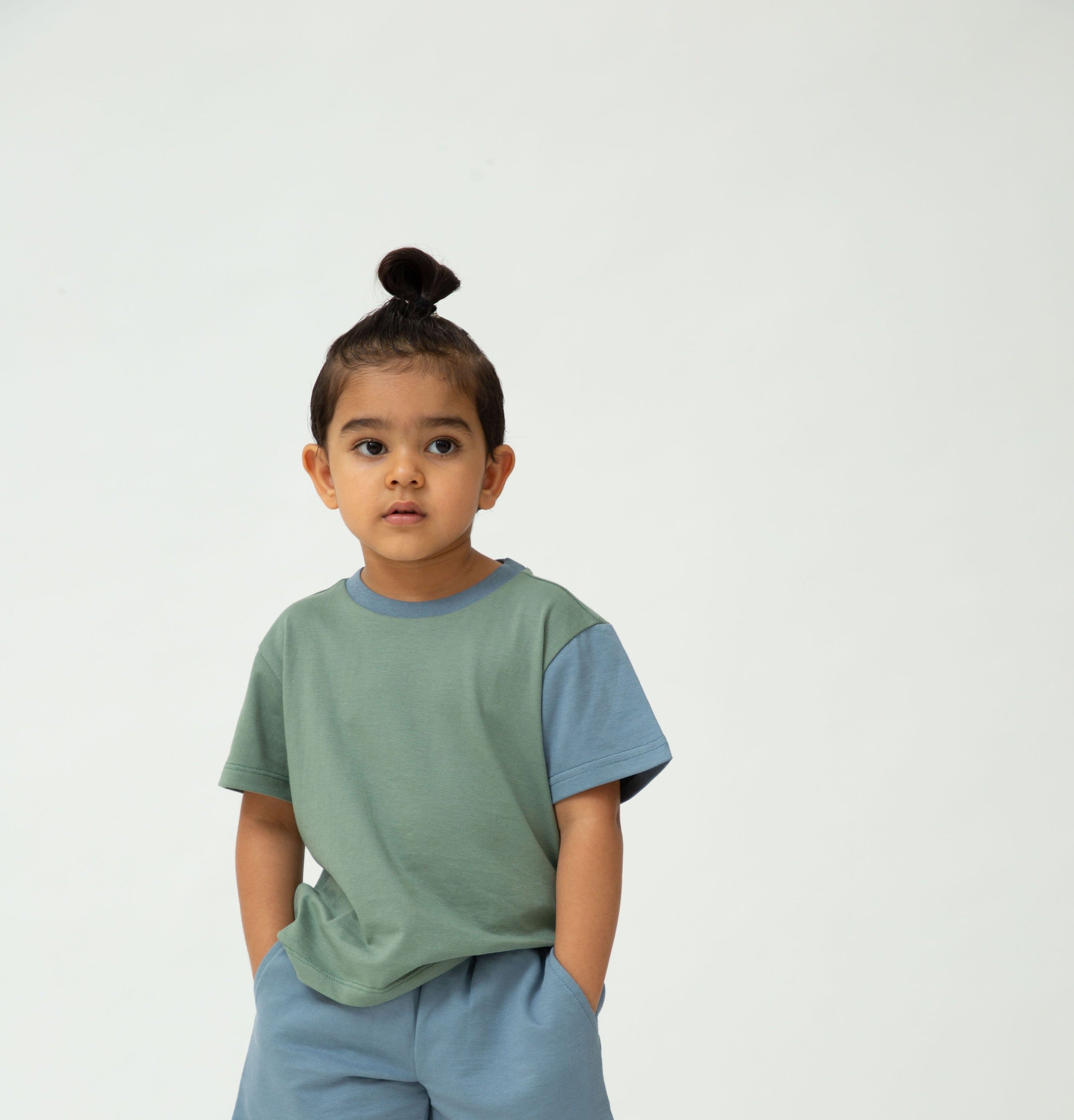 Saltpetre organic, casual unisex kids wear for boys and girls. Organic aqua blue & green colour blocked sleeve cotton t-shirt. Pastel-shade theme