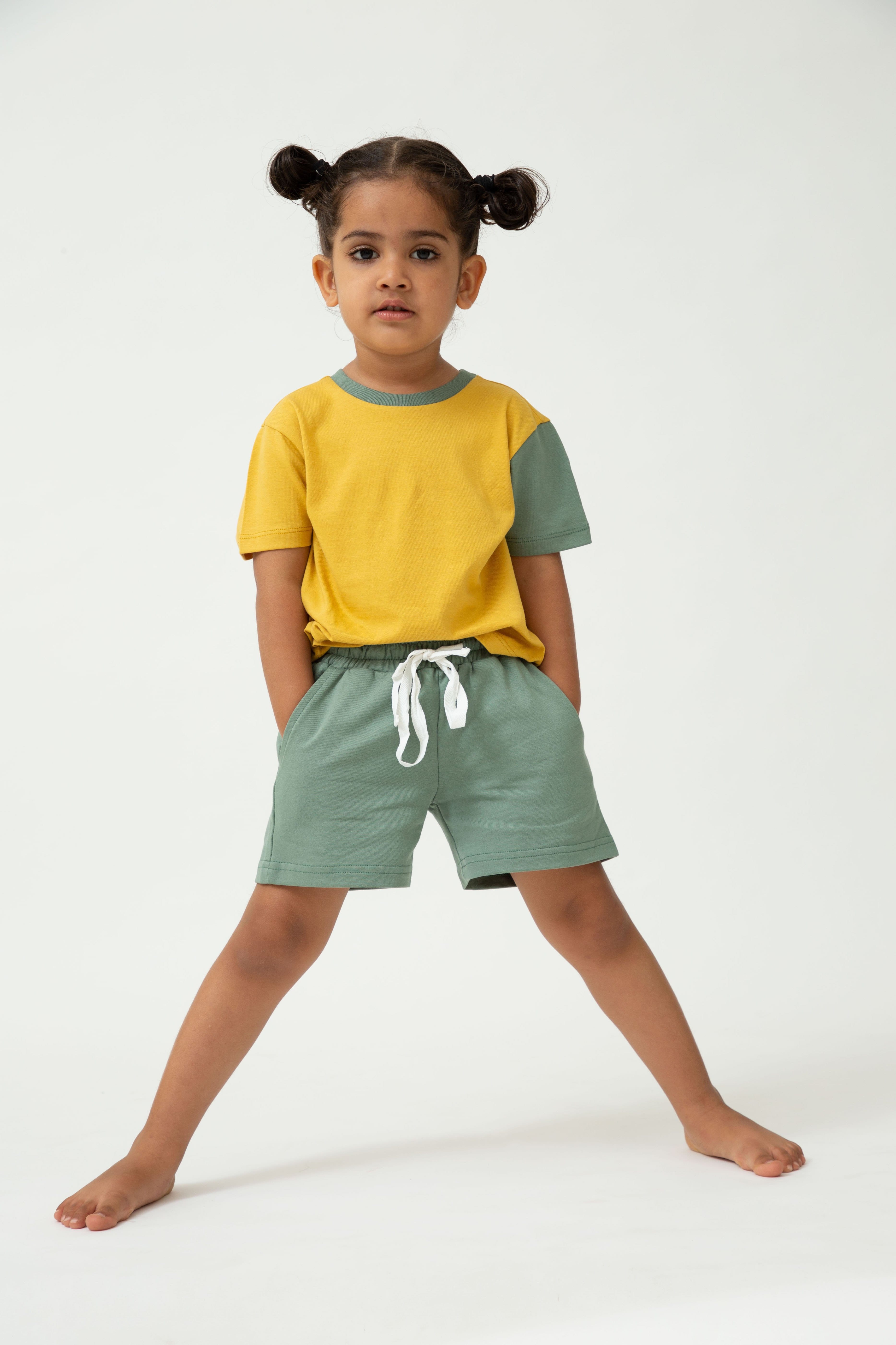 Saltpetre Set of half sleeve yellow t-shirt with green colour blocked sleeve and green pants or shorts with pockets for kids, in combination set, for casual and party wear