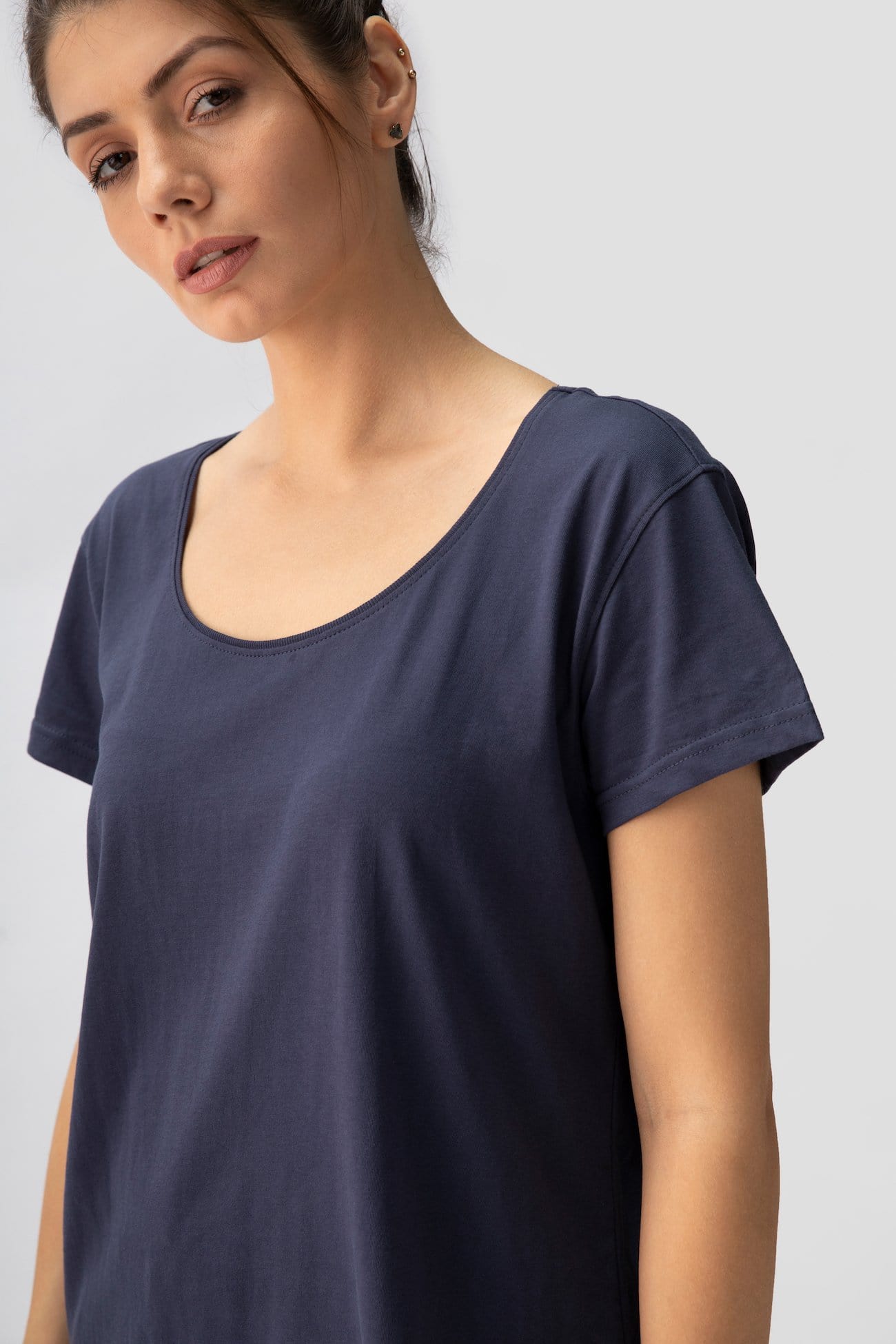 Saltpetre womens 100% organic half sleeve shirt with round neck and loose ankle length pants with pockets for lounge and casual wear. In navy blue color