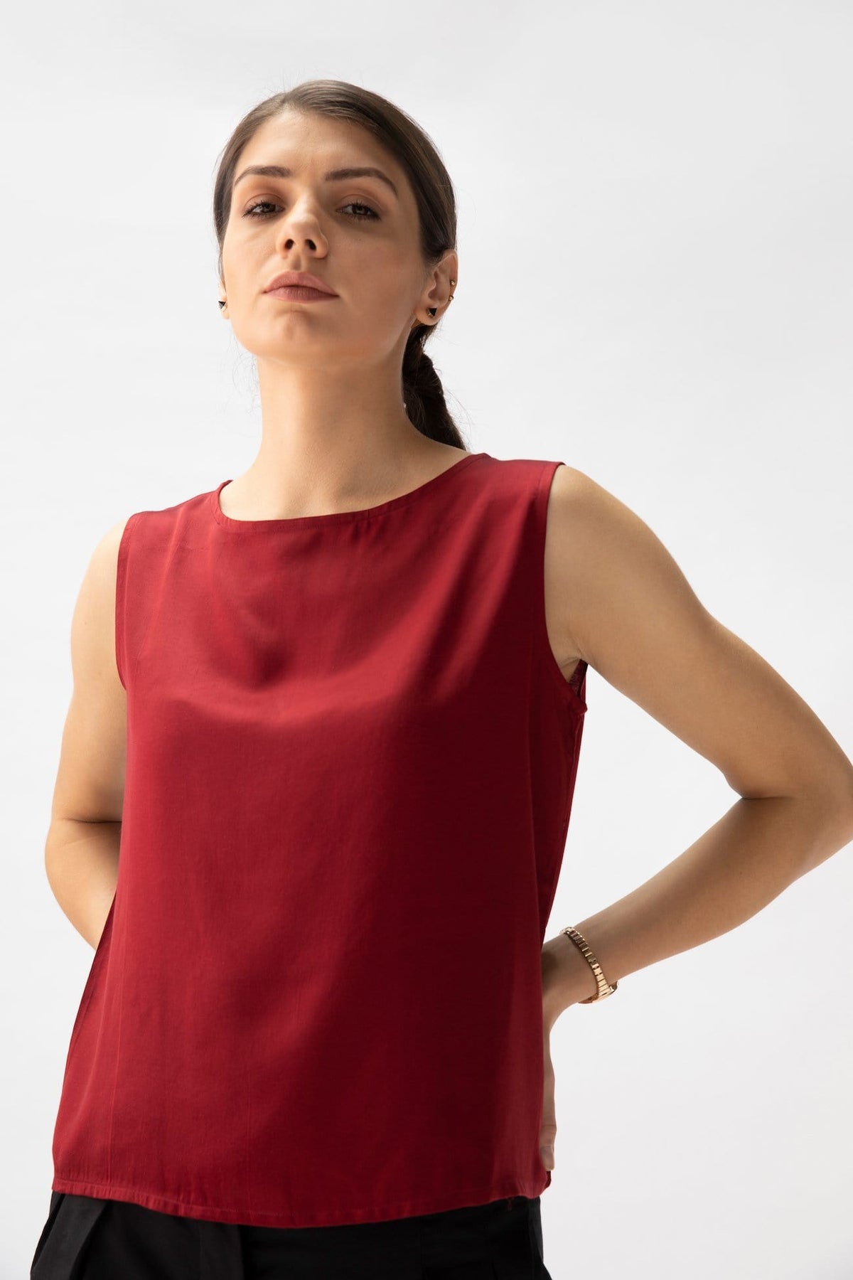 Saltpetre womens wear, indo-western shell top for semi formal, casual, occassional wear. Comfortably elegant woth delivate feminine straps in maroon red colour.