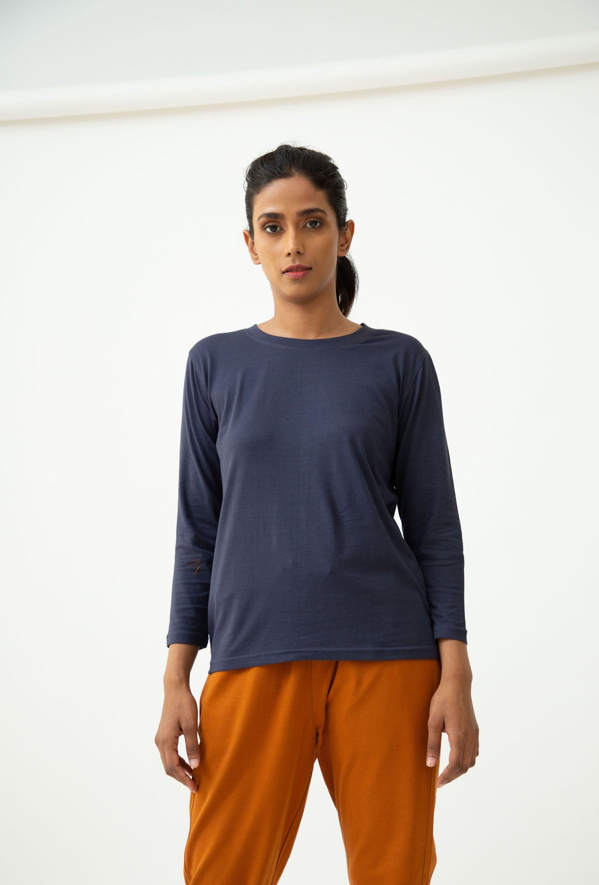 Saltpetre womens wear, lounge wear for casual wear.
 Comfortable crew neck, full sleeve t-shirt in navy blue colour. Made from 100% organic cotton.