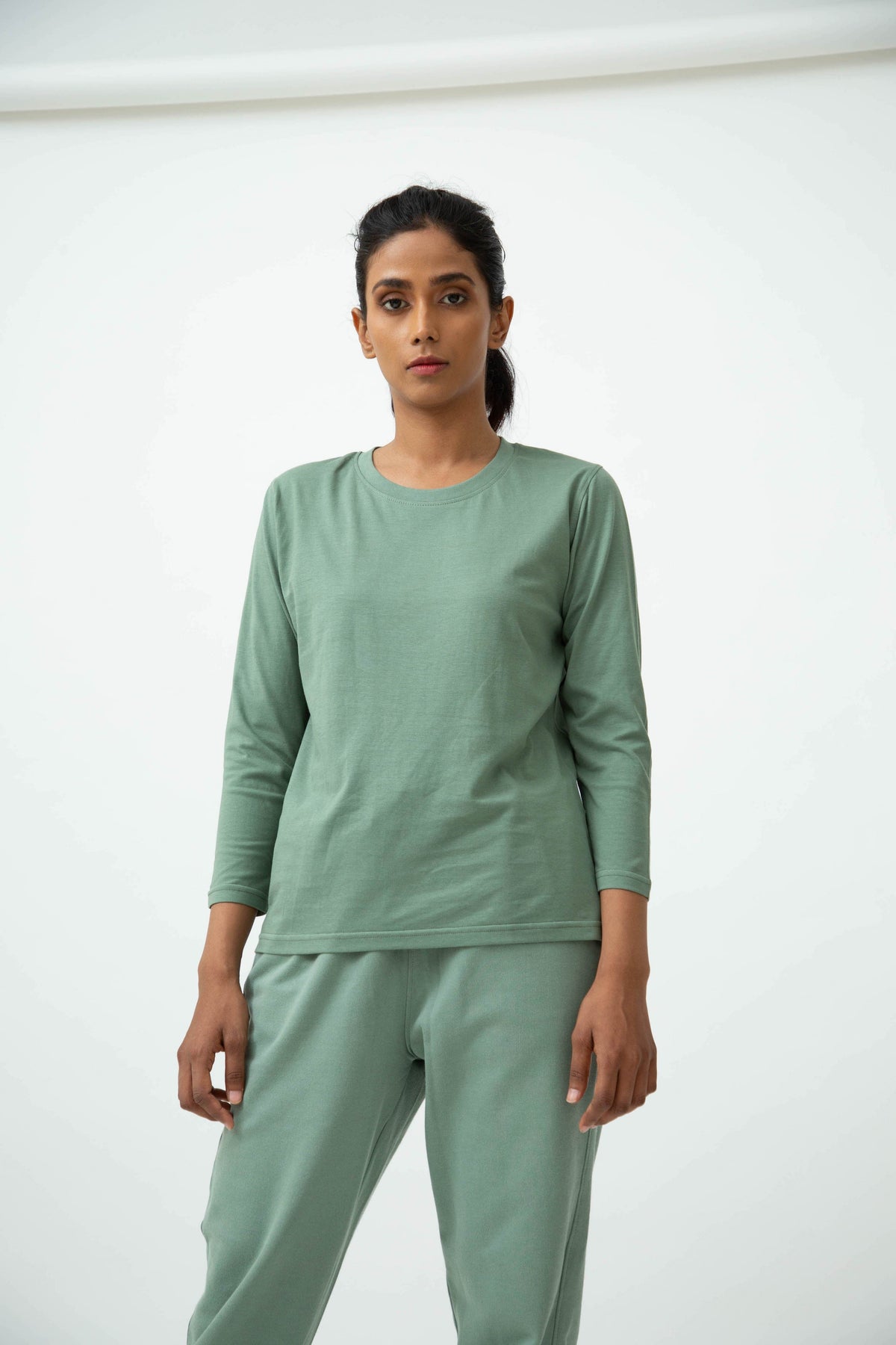 Saltpetre womens wear, lounge wear for casual wear.
 Comfortable crew neck, full sleeve t-shirt in sage green colour. Made from 100% organic cotton.
