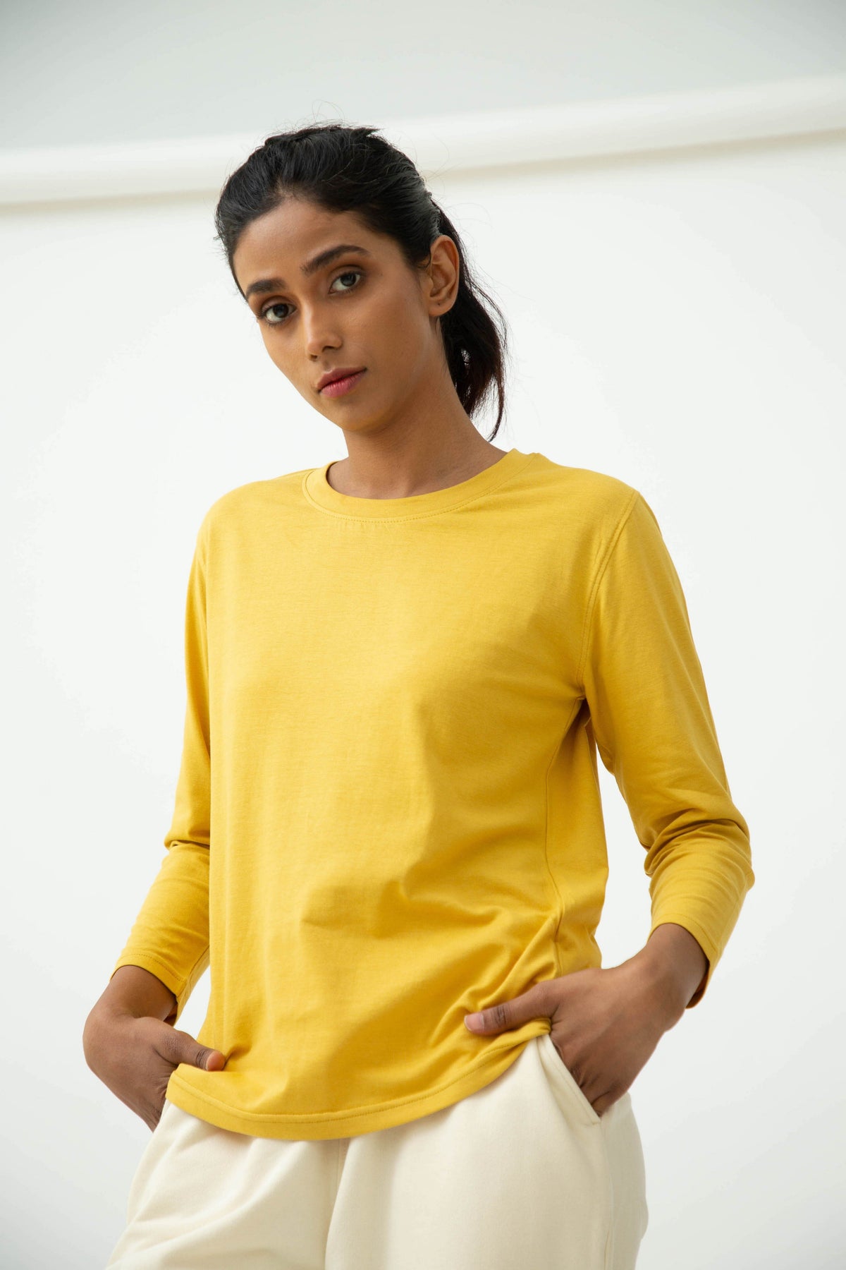 Saltpetre womens wear, lounge wear for casual wear.
 Comfortable crew neck, full sleeve t-shirt in sunshine yellow colour. Made from 100% organic cotton.