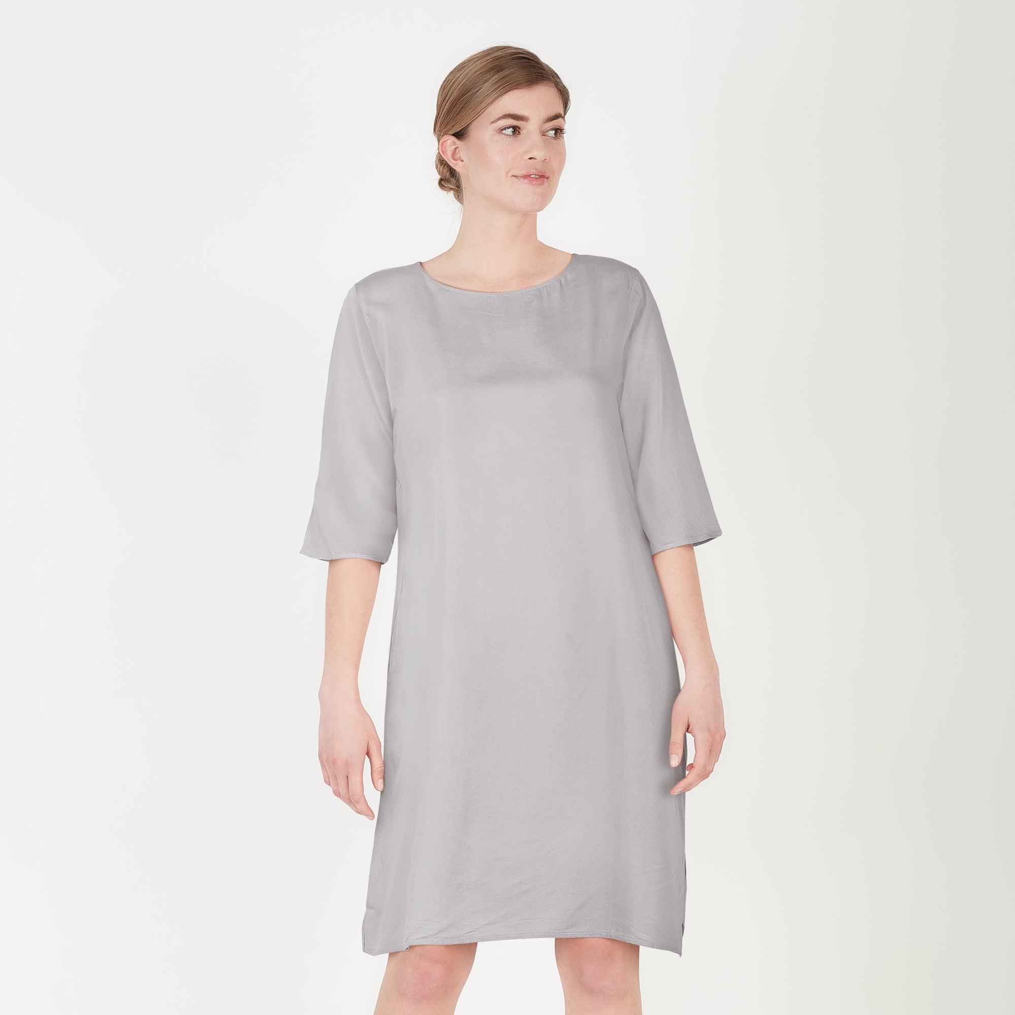 Saltpetre womens wear, indo-western knee length dress for semi formal, casual, occassional wear.
 Comfortably elegant dress in grey colour with three quarter sleeves, side slits and side pockets.